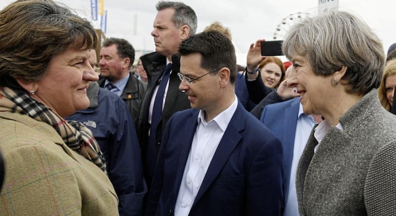 Prime Minister Theresa May and Northern Ireland Secretary James Brokenshire meet DUP leader Arlene Foster during a visit to the Balmoral Show on Saturday. Picture by Stefan Rousseau/PA Wire 