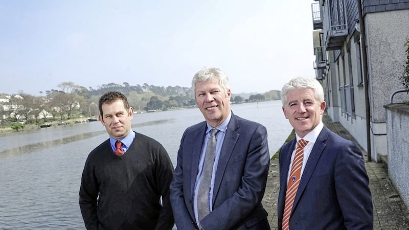 Belfast-born Irish News personal finance columnist and Worldwide Financial Planning chairman Peter McGahan (right) with new appointees James Barclay (left) and Simon Funge 