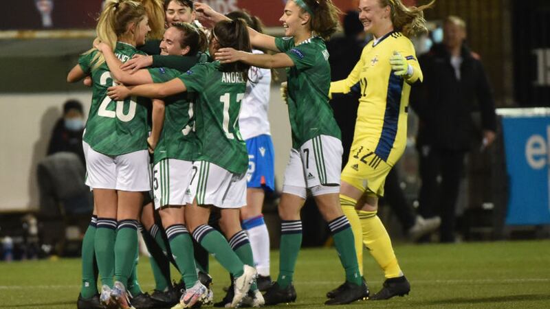 Chloe McCarron (second from right) and her Northern Ireland tesam-mates celebrate reaching the Euro 2022 play-off after beating the Faroe Islands in December 2020.<br />Pic Colm Lenaghan/Pacemaker&nbsp;