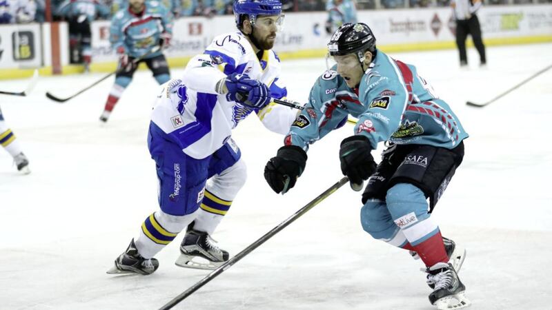 Belfast Giants&#39; Chris Higgins with Fife Flyers&#39; Kyle Haines during the final home game of the 2017 season and home leg of the Elite Ice Hockey League Playoff quarter-final at the SSE Arena, Belfast on April 1 2017. Picture by William Cherry 