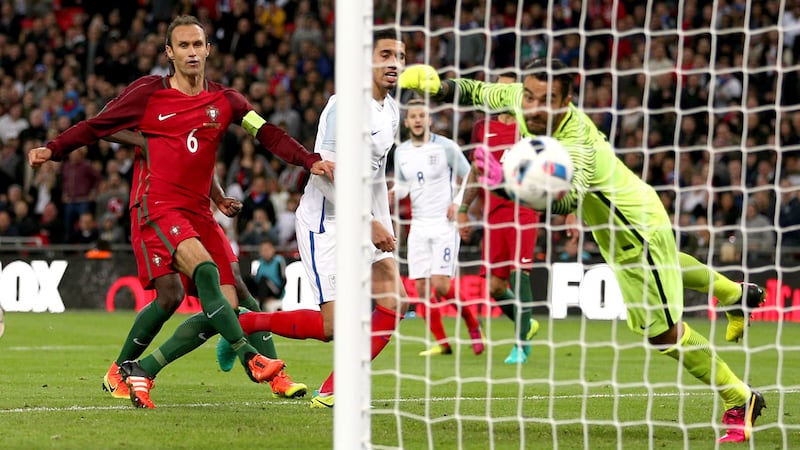 England's Chris Smalling heads home the only goal in Thursday's international friendly against Portugal at Wembley<br />Picture by PA&nbsp;