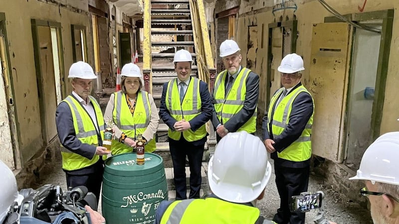 Pictured at the investment announcement at Crumlin Road Gaol are Stormont ministers Deirdre Hargey, Gordon Lyons and John O&#39;Dowd with Belfast Distillery Company chief executive John Kelly and Invest NI interim chief executive Mel Chittock 