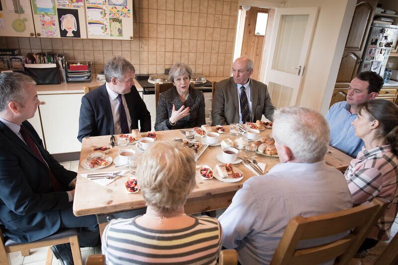 &nbsp;Prime Minister Theresa May having lunch with farmers at Fairview Farm in Bangor, Northern Ireland during a tour of the four nations of the UK, with a promise to keep the country united one year before Brexit. Stefan Rousseau/PA Wire