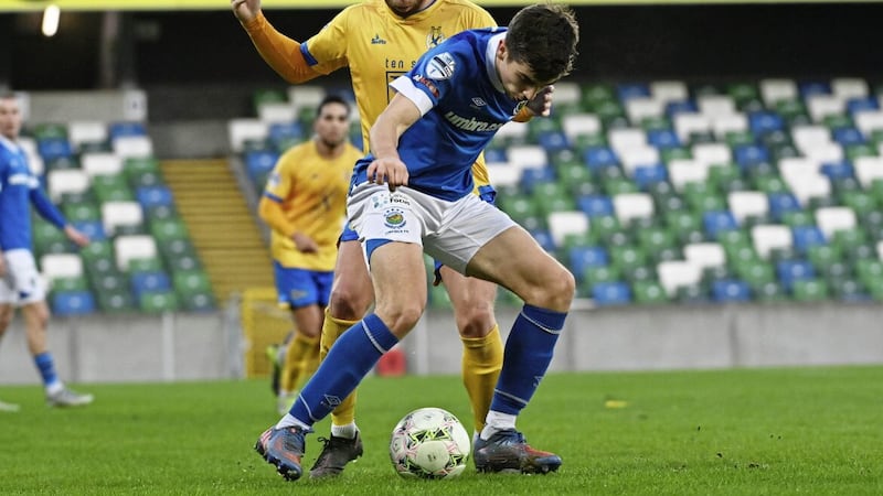 Linfield&#39;s Cameron Palmer and Dungannon&#39;s James Knowles during Saturday&#39;s Danske Bank Premiership match at Windsor Park Picture: Colm Lenaghan/ Pacemaker. 