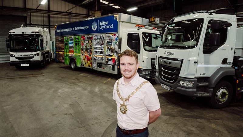 Lord Mayor of Belfast Councillor Ryan Murphy at the Duncrue Complex alongside council HGVs running on hydrotreated vegetable oil (BCC/PA)