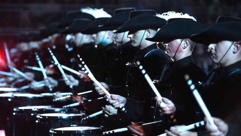 The Top Secret Drum Corps mixes traditional drumming with striking visual effects.