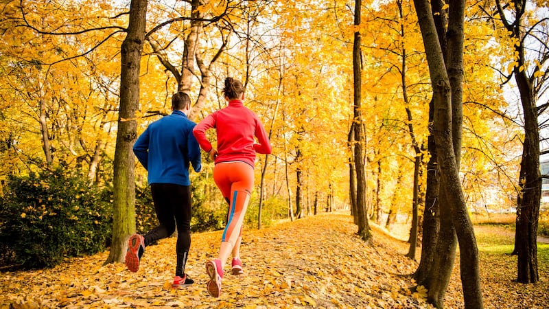 The cooler weather is the perfect time to pull on those trainers (Alamy/PA)