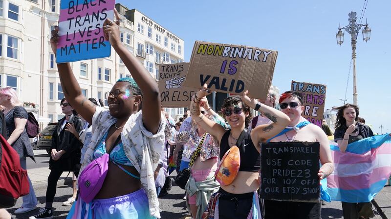 People take part in a Trans Pride protest march in Brighton (PA)