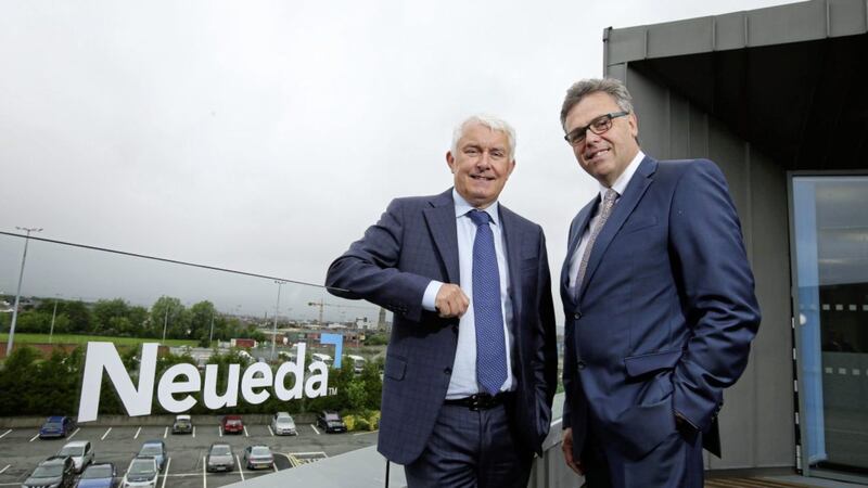 Belfast based digital transformation company Neueda is investing &pound;12 million to create 165 new jobs in Belfast. Pictured are Brendan Monaghan, CEO of Neueda and Alastair Hamilton, CEO of Invest NI. Picture by Kelvin Boyes / Press Eye 