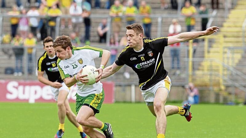 Antrim&#39;s Mark Sweeney (right) could be key to their defensive effort against Donegal. Pic Philip Walsh 