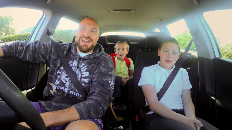 Tyson doing the school run with his sons (Prince John James Fury and Prince Tyson "Tutty" Fury II ) following his retirement. Picture by Netflix