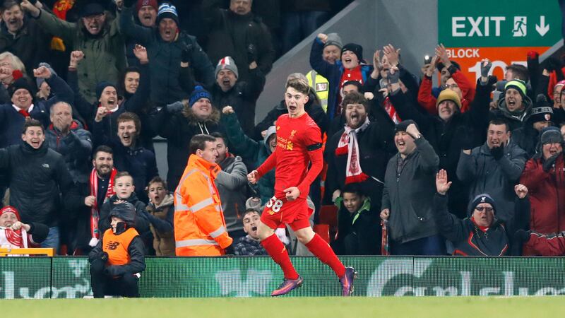 Liverpool's Ben Woodburn celebrates his goal in front of the Kop on Tuesday night<br />Picture by PA&nbsp;
