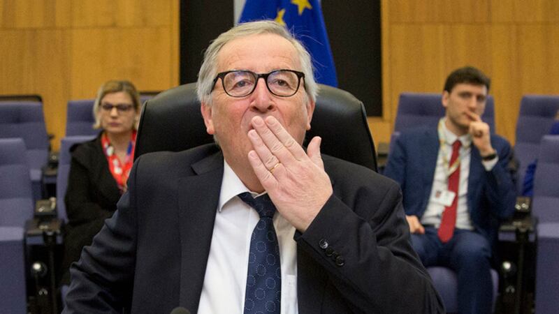 European Commission President Jean-Claude Juncker gestures to photographers during a meeting of the college of commissioners at EU headquarters in Brussels&nbsp;