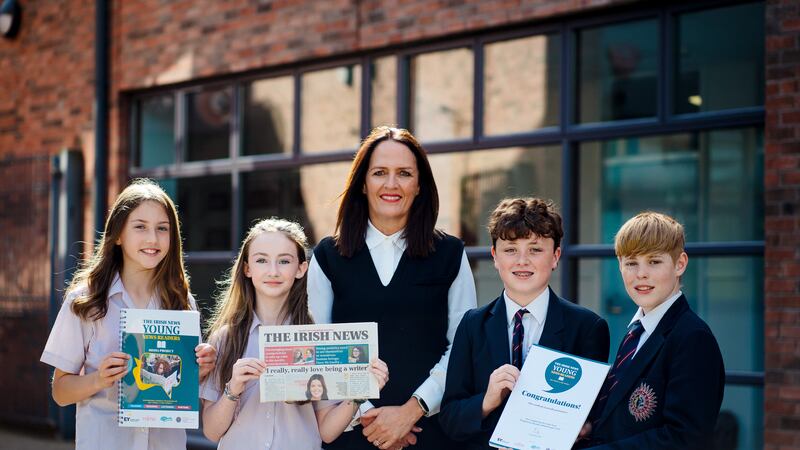   Katie Napier, Cara McLaverty, Myles O’Connor and Micah Monaghan from Aquinas Grammar School pictured with Geraldine Guest, Devolved Delivery Director at Fujitsu NI.