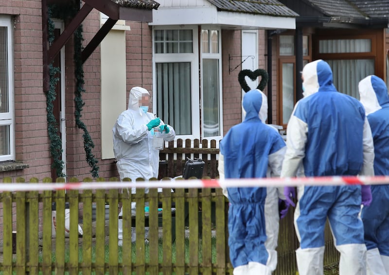 Police and forensics at the scene of a murder in the Woodland Walk area of Limavady, Co-Derry on Saturday.