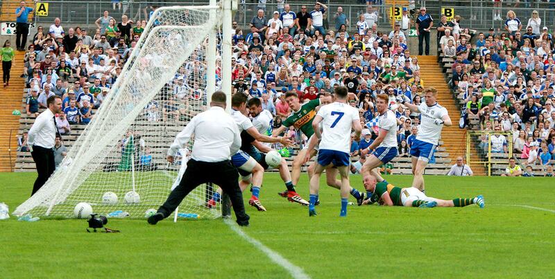 Kerry's David Clifford watches as his shot finds the corner of Rory Beggan's net during Kerry's clash with Monaghan in the second round of the Super 8s.&nbsp; Picture by Seamus Loughran