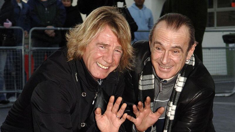 File photo dated 16/12/06 of Status Quo's Rick Parfitt (left) and Francis Rossi during the unveiling of the plaque of their handprints at Wembley's Square of Fame, in north London&nbsp;