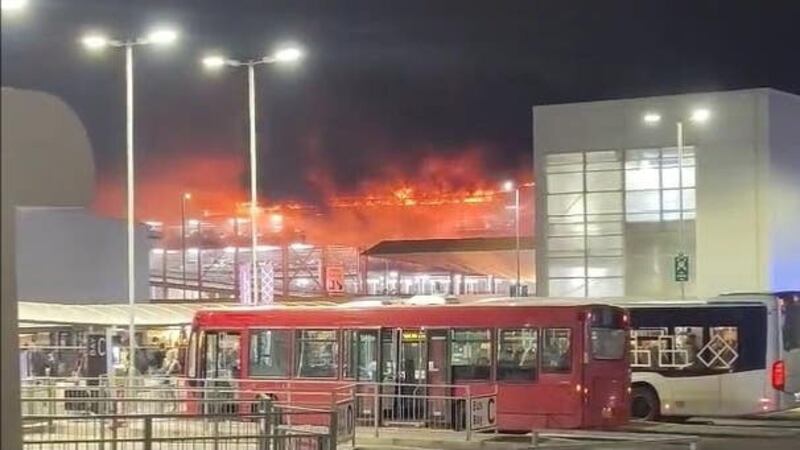 Screen grab taken with permission from video posted on X by @Soriyn23 of a fire at a car park at Luton Airport (Twittet/SoRin)
