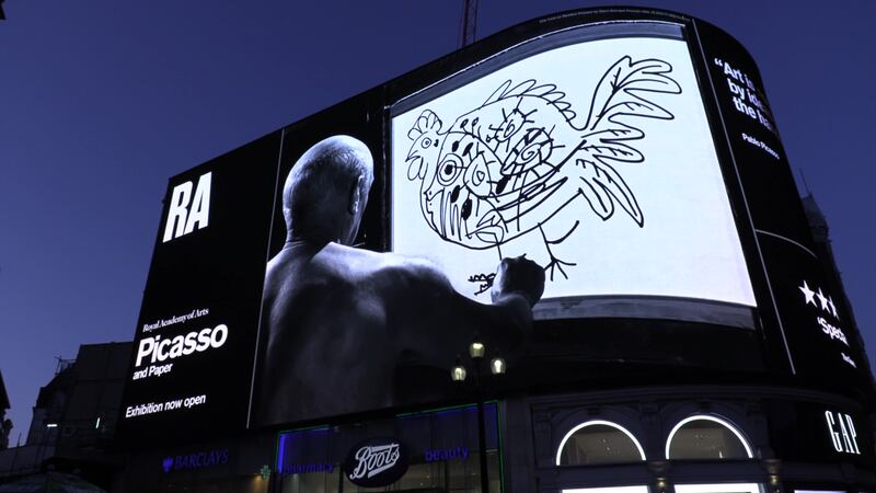 Forty-seven years after his death, documentary footage of artist Pablo Picasso at work was broadcast in Piccadilly Circus.