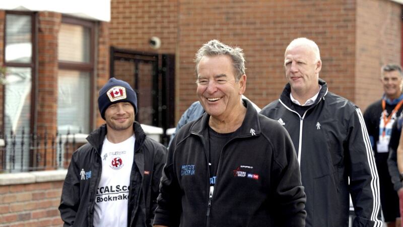 Sky Sports Soccer Saturday anchorman Jeff Stelling (centre) with boxer Carl Frampton (left) and former Northern Ireland striker Iain Dowie (right) walking in Belfast for Prostate Cancer UK.<br /> Photo Laura Davison/Pacemaker Press