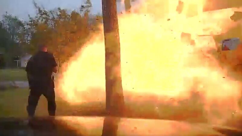 The huge fireball was caused by gas released after a car crashed into the property.