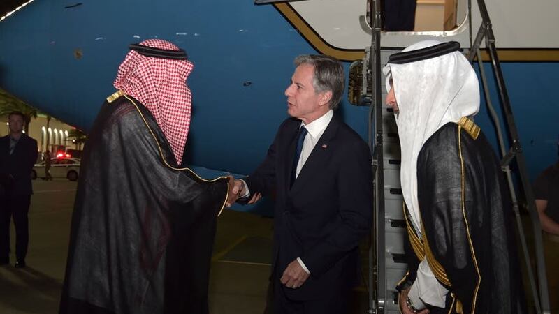 Antony Blinken shakes hands with a Saudi official upon his arrival (Pool via AP)