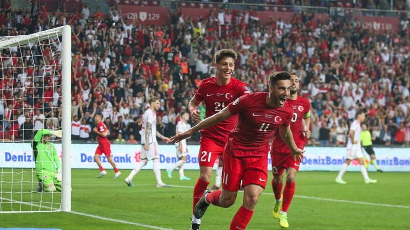 Turkey’s Umut Nayir celebrates opening the scoring against Wales (Murat Akbas/Dia Images via AP)
