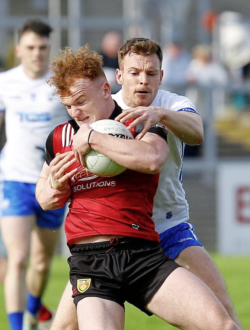 Down's Danny Magill holds off Waterford's Dermot Ryan Picture: Philip Walsh