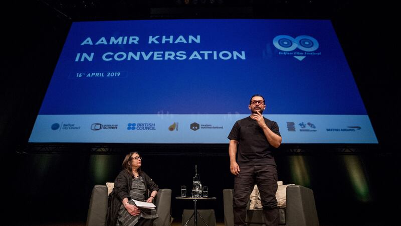 Aamir Khan said his films went viral in China even before they were released there due to piracy, speaking on his first visit to Belfast.