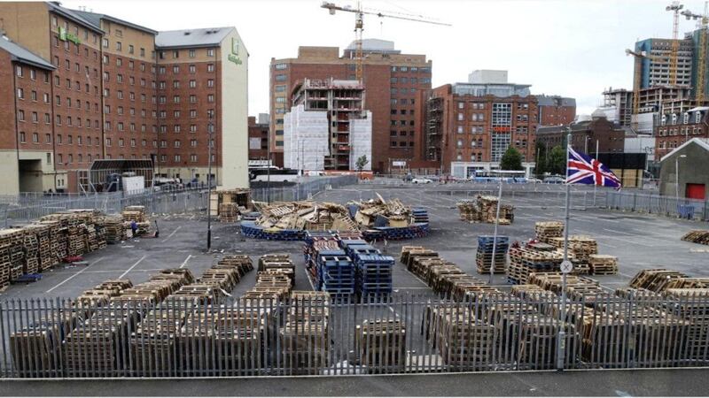 Pallets at the Sandy Row bonfire beside central Belfast&#39;s Holiday Inn 