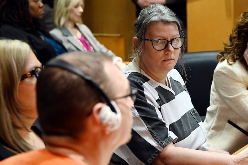 Jennifer Crumbley stares at her husband James Crumbley during sentencing at Oakland County Circuit Court in Michigan on Tuesday (Clarence Tabb Jr/Detroit News via AP)