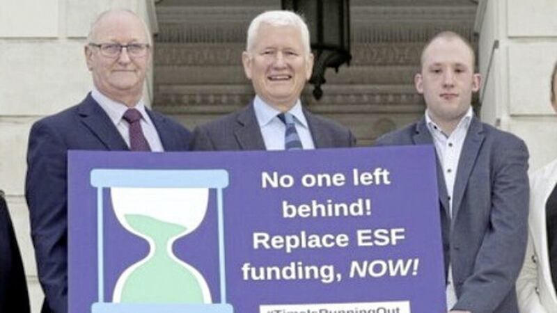 Norman Sterritt, NIUSE; David Babington, Action Mental Health; and Conor McGinnity, Mencap service user, pictured at Stormont last year highlighting the risks posed by the withdrawal of the European Social Fund, which ends in the north this Friday. 