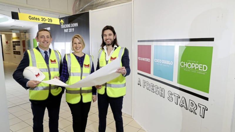 Marcon Fit-Out director Mark O&rsquo;Connor (left) with Deirdre Graffin, commercial manager at Belfast International Airport and Gavin Annon, head of sales and marketing at Mount Charles 