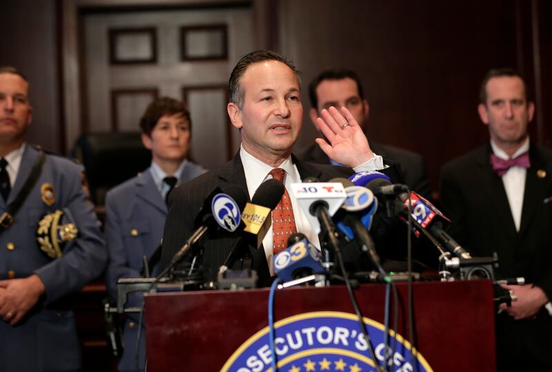 Coffina speaking at the news conference