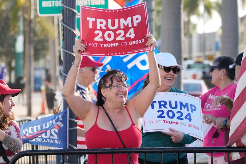 Supporters of former US President Donald Trump stand near the US Federal Courthouse in Fort Pierce (Marta Lavandier/AP)