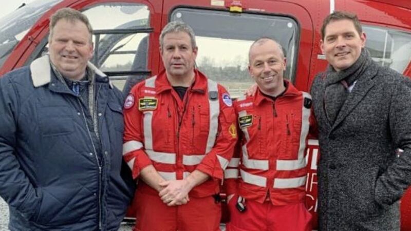 Andrew Trotter, owner of Trotter&rsquo;s Hardware Store in Dungannon, Dr Darren Monaghan, HEMS Clinical Lead, paramedic Glenn O&rsquo;Rorke, HEMS Operational Lead, and Malachi Cush