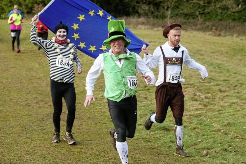 Runners take on a European theme at the annual Christmas Cracker Pairs race in Castlewellan organised by the Newcastle AC. Picture Mal McCann.
