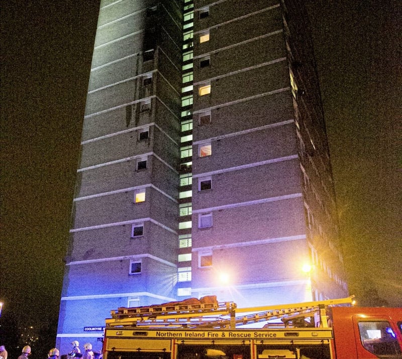 Emergency services at the scene of a fire at Coolmoyne House in Dunmurry, near Belfast, where residents have been evacuated from the building. Liam McBurney/PA Wire...