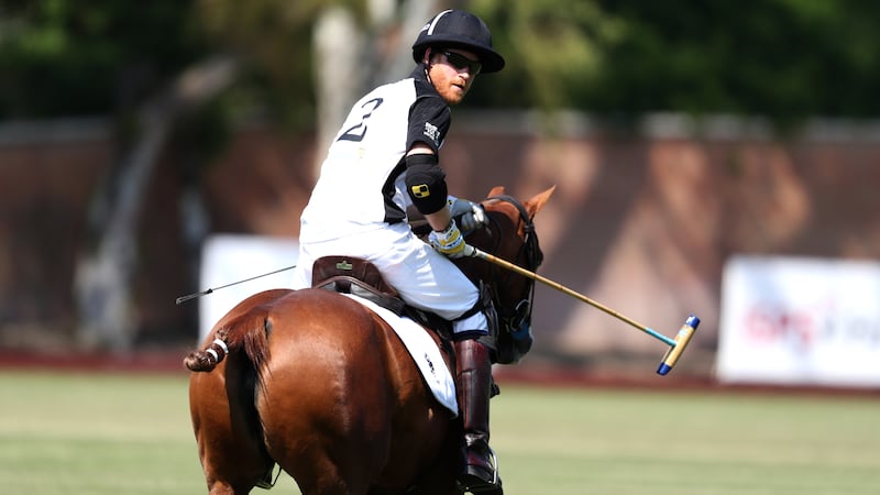 The Duke of Sussex takes part in the Sentebale ISPS Handa Polo Cup
