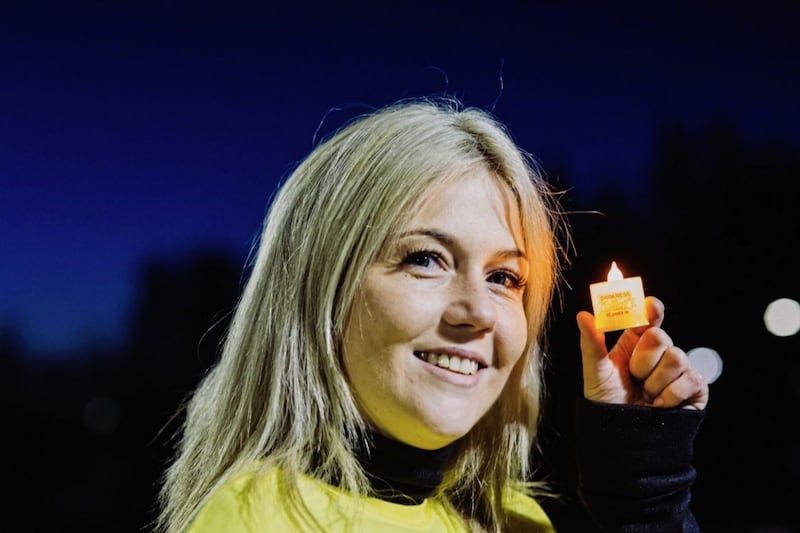 Nicola Mclaughlin pictured at the Dartkness into Light Suicide awarness walk at V36 in Newtownabbey. Picture John Murphy Aurora PA. 