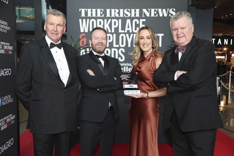 Comedian and awards host Neil Delamere with editor Noel Doran, chief marketing office Annette McManus and business editor Gary McDonald at the Irish News Workplace and Employment Awards. Picture by Hugh Russell