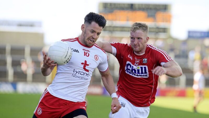 Tyrone&#39;s Matthew Donnelly gets past Cork&#39;s Ruairi Deane in last year&#39;s Round Four meeting. Tyrone are expected to win again in tonight&#39;s Super 8s clash 