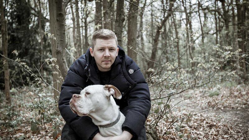 Professor Green in a London Park with his dog Arthur. Photographer: Duncan Stingemore 