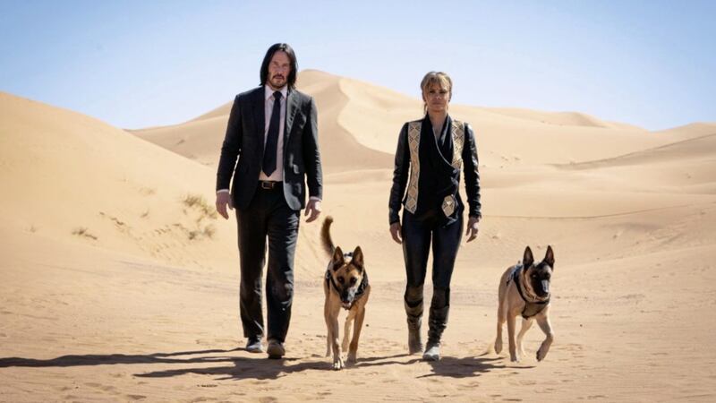 Keanu Reeves as John Wick and Halle Berry as Sofia in John Wick Chapter 3: Parabellum 