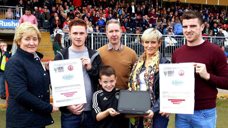 Tyrone chairperson R&oacute;is&iacute;n Jordan with county footballer Conor Meyler, children&rsquo;s officer Adrian Nugent, health and wellbeing committee chairperson Fiona Teague and county footballer Connor McAliskey at the launch of the Tyrone Health and Wellbeing Committee campaign on e-safety <br />Picture: S&eacute;amus Loughran