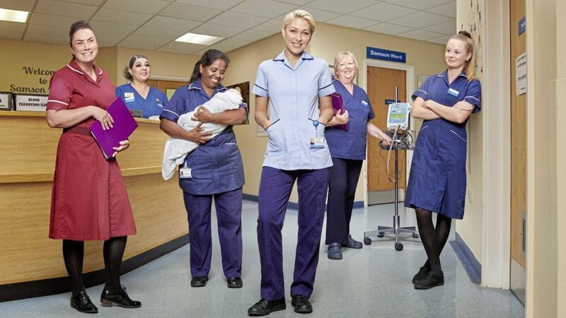 Presenter Emma Willis, centre, and colleagues from the hospital where she worked on Emma Willis: Delivering Babies 