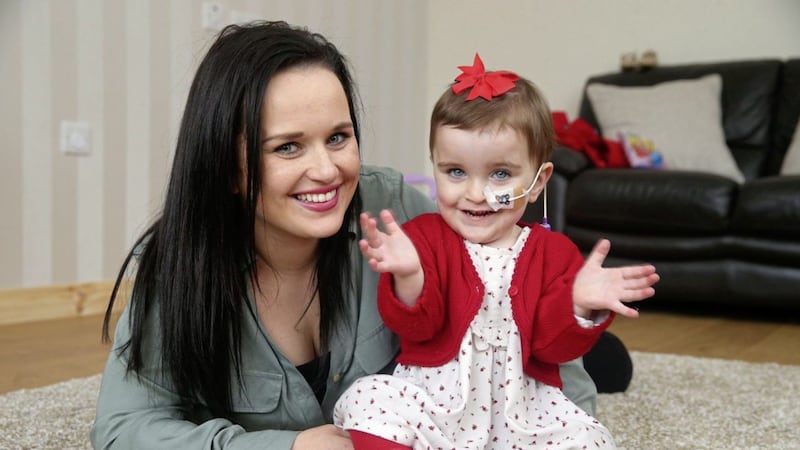 Fionnuala McArdle with her daughter Meabh, now aged two who was born four months early, weighing just one pound and half an ounce Picture: Mal McCann 