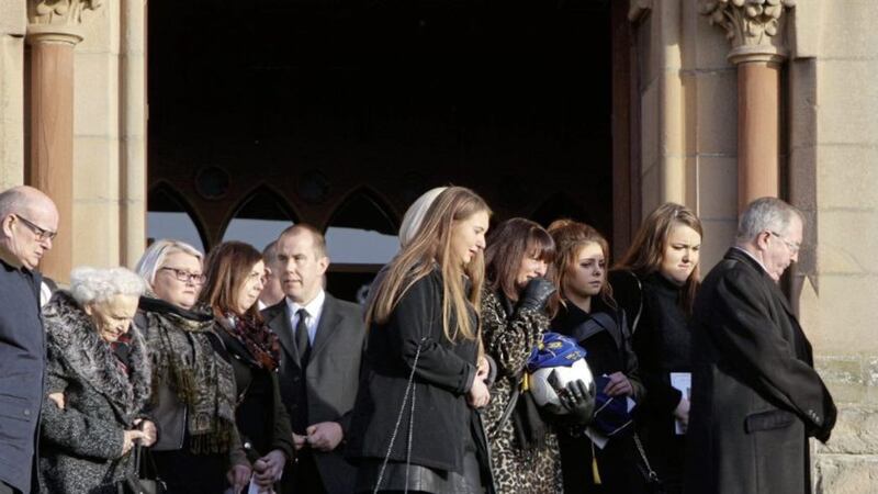 Family and friends at the funeral of former Cliftonville goalkeeper Paul Straney in Downpatrick. Picture by Ann McManus 