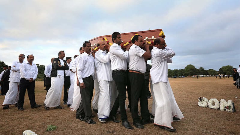 The coffin of Gurushanth Srithavarajah is carried to into marquee tents on Winn's Common Park in London at the funeral of the 5 friends who died at Camber Sands, near Rye in East Sussex last month. Picture by Jonathan Brady, Press Association&nbsp;