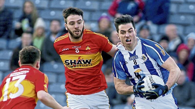 17/3/2016 Ballybodens  michael darragh mc auley   comes under pressure from Castlebars .ger mc donagh and stephen keane  in yesterdays All Ireland Culb Football Final at Croke Park pic seamus loughran.